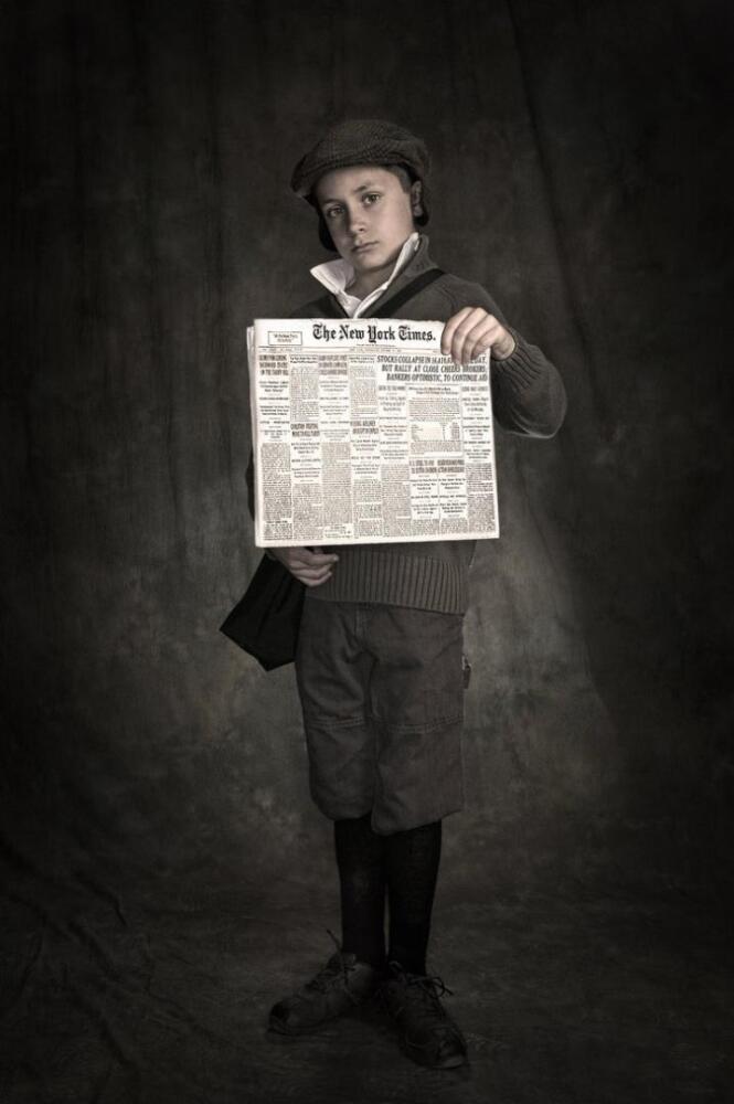 newspaper_boy_by_charliegphoto-d3ag24i.jpg