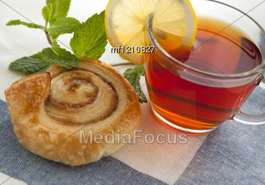 cup-tea-cinnamon-danish-bun-textile-mf1210827.jpg.jpeg
