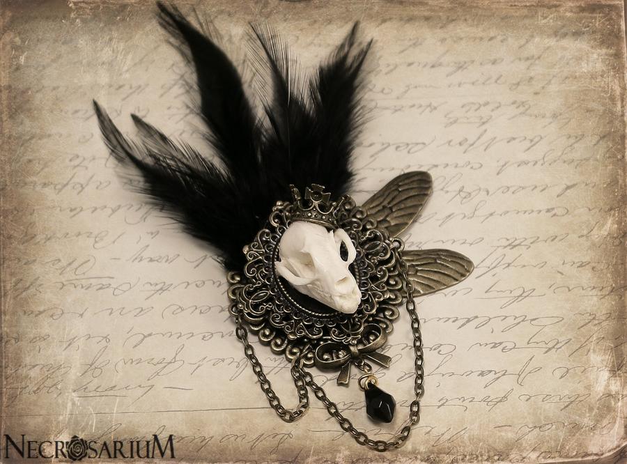 feathered_bat_skull_brooch_by_necrosarium-d5hy01w.jpg.jpeg