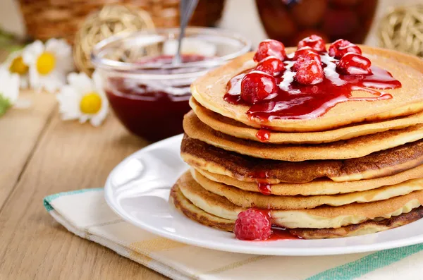 depositphotos_18940061-stock-photo-delicious-pancakes-with-raspberries-on.jpg.webp