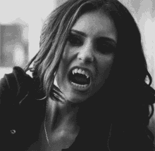 katherine-pierce-fangs.gif